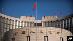 中国央行主管的媒体批评疯抢国债现象，警告市场不要炒作意味浓厚。