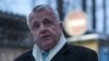 FILE PHOTO: U.S. ambassador to Russia John Sullivan speaks with journalists in Moscow