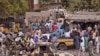FILE - In this photo taken Jan. 27, 2015, Nigerian soldiers on a truck patrol at a market after recent violence in areas surrounding Maiduguri. In a major offensive against Boko Haram, Nigerian and Chadian jets are bombing the Islamic extremists from nort