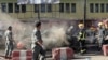 Afghan policemen inspect the site of a blast in Jalalabad city, Afghanistan, July 1, 2018. 