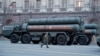 FILE - A Russian serviceman walks past S-400 missile defense systems in central Moscow, Russia, April 29, 2019.