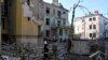 Rescuers search for victims in an apartment building destroyed by a Russian missile attack in Lviv, Western Ukraine, Sept. 4, 2024. 