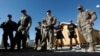 U.S. troops listen to a security briefing before leave their base in Logar province, Afghanistan, August 5, 2018.