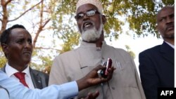 Ahmed Madobe, leader of the Ras Kamboni militia, speaks during a meeting for the creation of a State of Jubaland in Kismayo, Somalia, Feb. 28, 2013.