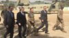 Defense Secretary Jim Mattis, second left, arrives at Resolute Support headquarters in Kabul, Afghanistan, Sept. 7, 2018.