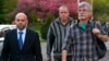 A member of a group of foreign military observers (C) who had been held by Ponomarev's group and released, leaves the city hall with representatives of the Organization of Security and Cooperation in Europe, Slovyansk, eastern Ukraine, April 27, 2014.