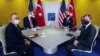 Turkey's President Recep Tayyip Erdogan (L back), Turkish Foreign Minister, Mevlut Cavusoglu (L), U.S. President Joe Biden (R back) and U.S. Secretary of State Antony Blinken (R) attend a meeting during the G20 Summit at the Roma Convention Center La Nuvola in Rome, Italy.