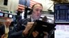 Wall Street sube con fuerza tras reporte de empleo y comentarios de Powell