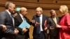 Danish Foreign Minister Anders Samuelsen and French Minister for Foreign Affairs Jean-Yves Le Drian talk with Britain's Foreign Secretary Boris Johnson, European commissioner Johannes Hahn and Austrian Foreign Minister Karin Kneissl during an EU foreign minister meeting in Luxembourg, April 16, 2018.