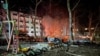 Destroyed cars are seen next to a residential building damaged during a Russian drone strike, amid Russia's attack on Ukraine, in Odesa, Ukraine, Jan. 17, 2024. (Press Service of the Operational Command 'South'/Handout via Reuters). 