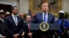 U.S. President Donald Trump speaks next to Federal Communications Commission Commissioner Ajit Pai during an event on U.S. 5G deployment in the Roosevelt Room of the White House in Washington, April 12, 2019. 