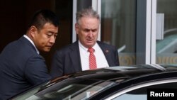 Australia's Trade Minister Don Farrell leaves Beijing Capital International Airport after his arrival in Beijing, China May 11, 2023. 