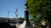 FILE - A weather-worn tarp covers the century-old Confederate monument in Grenada, Miss., April 12, 2023. On Sept. 11, 2024, the town took down the monument, which had been there since 1910. 