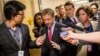 Republican presidential candidate, Sen. Rand Paul, R-Ky. is pursued by the media as he departs a news conference on Capitol Hill in Washington, June 2, 2015