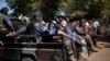 The Malian army patrol the streets of Gao, Northern Mali, Sunday Nov. 24, 2013. Malians have begun voting in legislative elections amid heavy security highlighting fears the poll could be sabotaged by rebel attacks. (AP Photo/Jerome Delay)