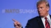 U.S. President Donald Trump gestures at his press conference after the NATO Summit in Brussels, Belgium, July 12, 2018. 