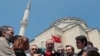 Turkish President Recep Tayyip Erdogan speaks to the media after Friday prayers, in Istanbul, June 7, 2019. 