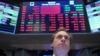 A trader works on the floor of the New York Stock Exchange (NYSE) in New York, March 9, 2020.