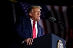 FILE - President Donald Trump speaks during a campaign rally at MBS International Airport, Sept. 10, 2020, in Freeland, Mich.