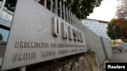 FILE - The headquarters of the U.N. Educational, Scientific and Cultural Organization in Paris.