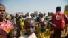 FILE - New Congolese refugees arrive at a refugee settlement in Kyangwali, Uganda, on Feb. 16, 2018.