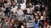 Demonstrators protest jailing of two journalists and an academic, outside the offices of Ozgur Gundem, a pro-Kurdish publication, Istanbul, June 21, 2016.