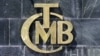 A picture taken on Aug. 14, 2018 shows the logo of Turkey's Central Bank (TCMB) at the entrance of the bank's headquarters in Ankara, Turkey.