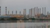 FILE - A general view of Abadan oil refinery in southwest Iran, is pictured from Iraqi side of Shatt al-Arab in Al-Faw south of Basra, Iraq Sept. 21, 2019. 