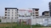 A sign advertises new apartment sales in Grigny, an area of with some of the highest rates of unemployment, school drop outs and illiteracy in France. 