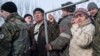 Local residents queue to get humanitarian aid at the humanitarian aid center in Avdiivka, eastern Ukraine, Feb. 3, 2017. 