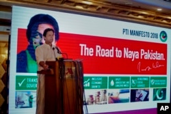 Pakistani opposition politician Imran Khan, leader of the Pakistan Tehreek-e-Insaf party, speaks during a press conference to present the party's manifesto for upcoming parliamentary elections, in Islamabad, Pakistan, July 9, 2018.