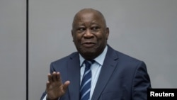 FILE - Former Ivory Coast President Laurent Gbagbo appears before the International Criminal Court in The Hague, Netherlands, Jan. 15, 2019. 