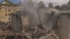 Emergency and rescue personnel along with medics and others clear the rubble of the destroyed building of Ohmatdyt Children's Hospital following a Russian missile attack in the Ukrainian capital of Kyiv on July 8, 2024, amid Russian invasion in Ukraine.