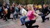 People make outdoor sport exercise to mark World Health Day in Kiev, Ukraine, Friday, April 7, 2017. The World Health Day is a global health awareness day celebrated every year on April 7, under the sponsorship of the World Health Organization (WHO). 