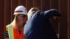 U.S. President Donald Trump signs his signature on the border wall while visiting a section of the U.S.-Mexico border wall in Otay Mesa, California, Sept. 18, 2019. 
