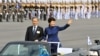 South Korean President Park Geun-hye waves as she inspects troops with Defense Minister Kim Kwan-jin during a ceremony marking the 65th anniversary of the founding of South Korea's Armed Forces, Seongnam, Oct. 1, 2013.