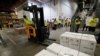 Boxes containing the Pfizer-BioNTech COVID-19 vaccine are prepared to be shipped at the Pfizer Global Supply Kalamazoo manufacturing plant in Portage, Michigan, Dec. 13, 2020. 