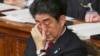 Japanese Prime Minister Shinzo Abe after delivering a speech calling for dialogue between Japan and neighbors, China and South Korea, at the lower house of Parliament in Tokyo, Jan. 24, 2014.