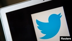 FILE - A portrait of the Twitter logo in Ventura, California.