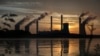 FILE - A coal-fired plant is seen emitting carbon dioxide, in Juliette, Georgia, June, 3, 2017. 