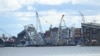 FILE - The collapsed Francis Scott Key Bridge is seen after it was struck by the container ship Dali, in Baltimore, Maryland, on April 5, 2024. 