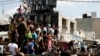 Hamas hành quyết những người Palestine bị nghi ngờ hợp tác với Israel tại thành phố Gaza ngày 22/8/2014. Trang web an ninh của Hamas Al-Majd hôm 11/3 cảnh báo các cá nhân hoặc nhóm người Palestine không hợp tác với Israel để đảm bảo an ninh cho các đoàn xe viện trợ.