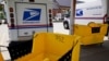 FILE - Mail boxes are seen on a sidewalk in New York City, August 14, 2020.
