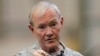 U.S. Chairman of the Joint Chiefs of Staff Army Gen. Martin Dempsey talks to U.S. military personnel stationed at Yokota Air Base in Tokyo, Apr. 25, 2013.