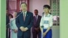 U.N. Secretary-General Ban Ki-moon, left, talks to reporters during a press conference following his meeting with Myanmar pro-democracy leader Aung San Suu Kyi, right, at her lakeside residence in Yangon, Myanmar, May.1, 2012. 