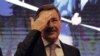 Melih Gokcek, Mayor of Ankara gestures as he announces his resignation, in Ankara, Turkey, Saturday, Oct. 28, 2017. 