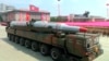 A military truck carrying a missile parades during a ceremony marking the 60th anniversary of the Korean War armistice in Pyongyang, North Korea, July 27, 2013.