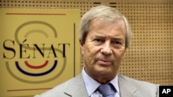 FILE - Vincent Bollore attends a hearing at the French Senate, June 22, 2016, in Paris, France. 
