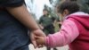 FILE - U.S. Border Patrol agents take Central American immigrants into custody near McAllen, Texas, Jan. 04, 2017.