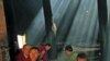 Monks gather to pray at the Labrang monastery before the Tibetan New Year in Xiahe county, Gansu Province, China, February 21, 2012. A teenage Tibetan Buddhist monk had set himself on fire and died in southwestern China, a rights group said, in the latest
